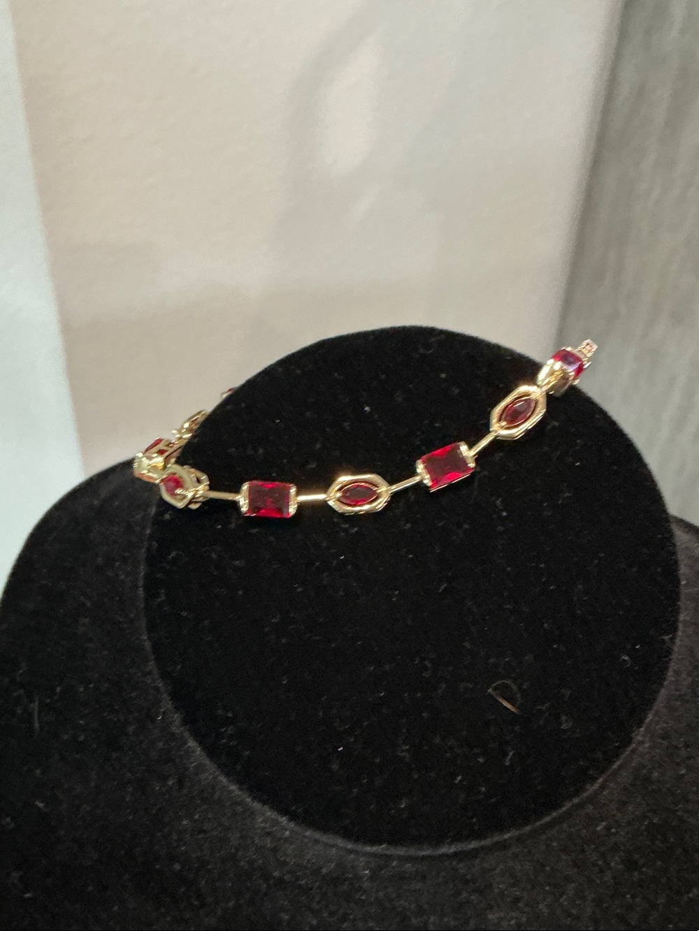 Gold Plated Bracelet with Red Gem Accents